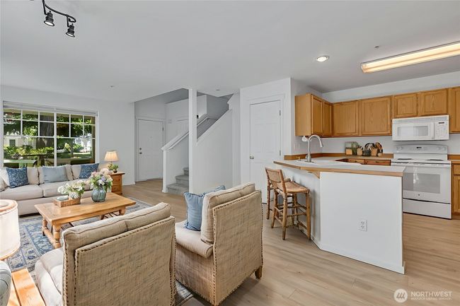 Thoughtfully laid out kitchen with lots of storage and work surface | Image 13