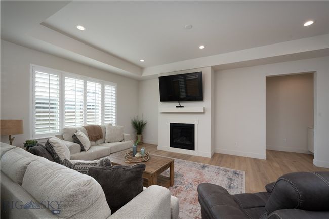 Love the plantation shutters and gas fireplace. | Image 6