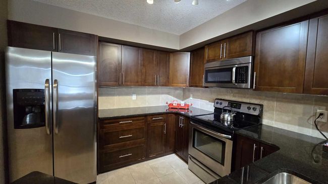 128 - 500 Rocky Vista Gardens Nw, Condo with 2 bedrooms, 2 bathrooms and 1 parking in Calgary AB | Image 5