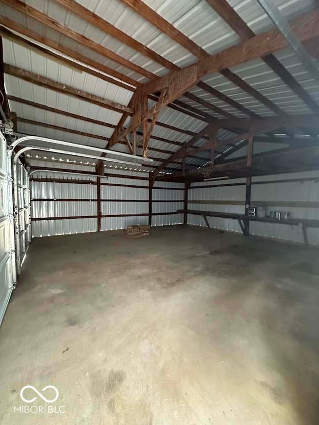 Concrete floors in detached garage. | Image 14