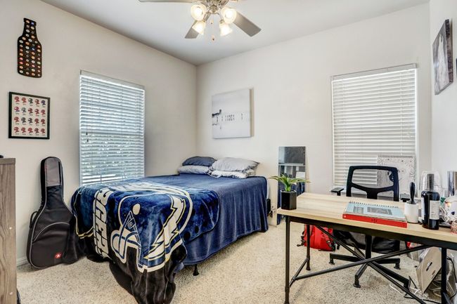Bedroom with ceiling fan | Image 15