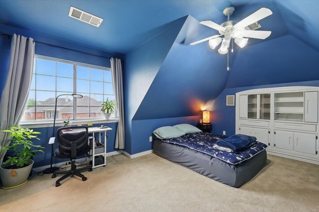 HUGE upstairs bonus room complete with 1/2 bath. Great for game room, man cave, sewing room, or alternate 5th bedroom. | Image 30