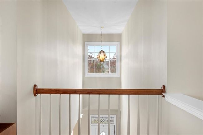 A charming balcony opens the space between the entry and bonus room area. | Image 30