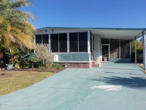 1002 Ginger Ln, Barefoot Bay, FL, 32976-7218 | Card Image