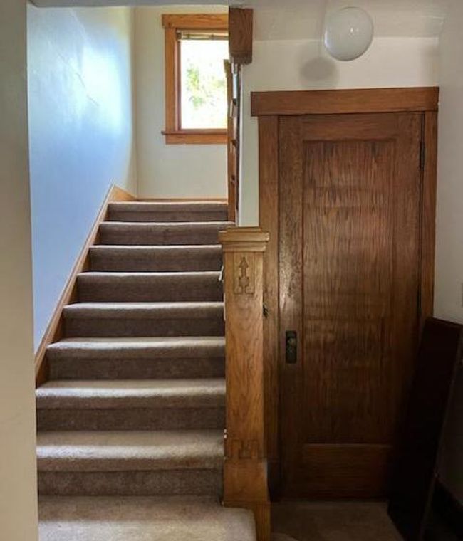 Carpeted stair to upper level ** Notice the ARROW on the banister | Image 25