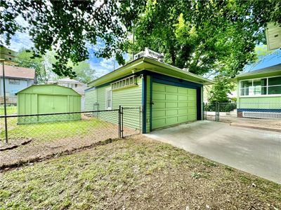 Garage with a yard | Image 3