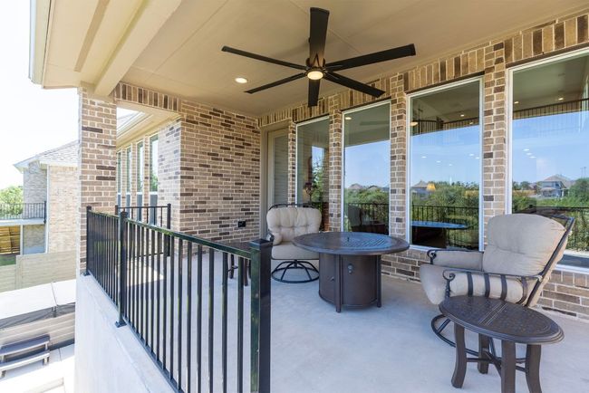 Patio / terrace featuring ceiling fan | Image 29