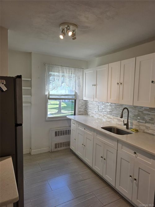 11-j-324 Post Ave, Elmont, NY, 11003 | Card Image