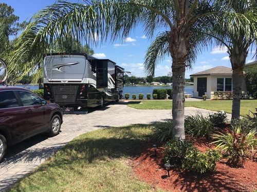 714 Meandering Way, POLK CITY, FL, 33868-5170 | Card Image