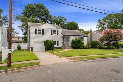 36 Gusto Ln, Roosevelt, NY, 11575-1828 | Card Image