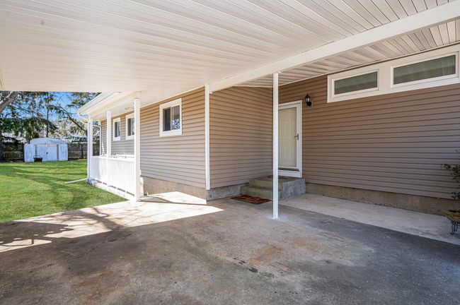 Basement with carpet | Image 21