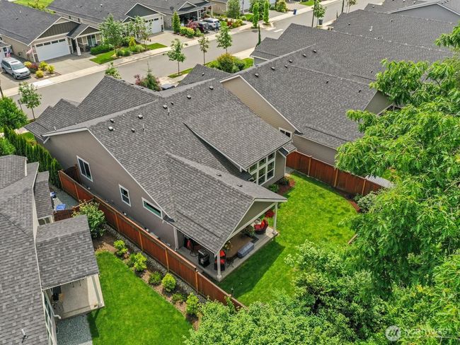 With mature landscaping beyond the fence, you'll have tons of privacy. | Image 21