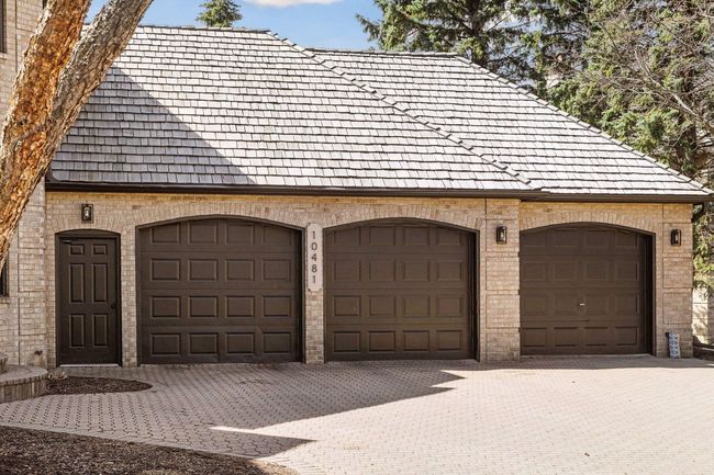 Oversized three car garage with floor drain | Image 62