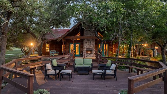 Wooden terrace featuring an outdoor hangout area | Image 21