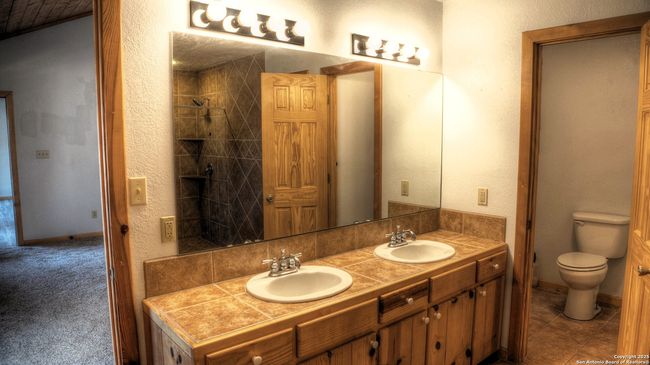 457 N Tomahawk Way, House other with 4 bedrooms, 3 bathrooms and null parking in Concan TX | Image 29