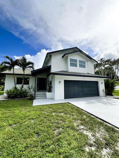 9312 Palomino Drive, House other with 5 bedrooms, 3 bathrooms and null parking in Lake Worth FL | Image 1