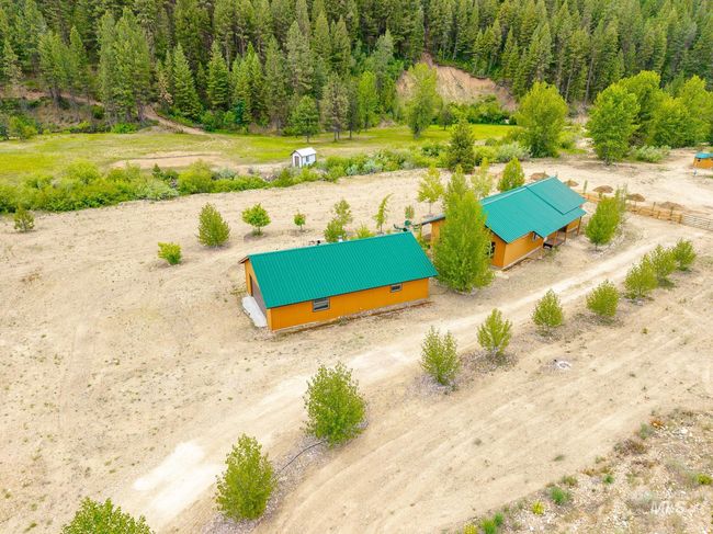 View of subject property with a heavily wooded area | Image 24