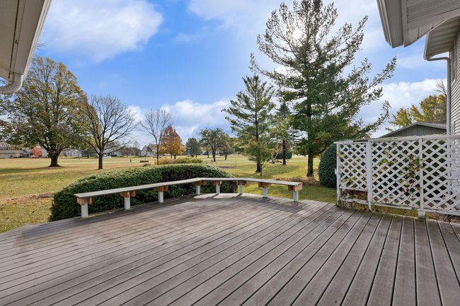 Deck with Bench and view to golf course | Image 44