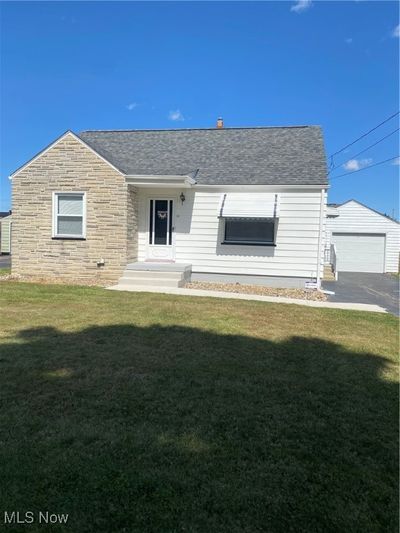 Rear view of house featuring a yard | Image 1