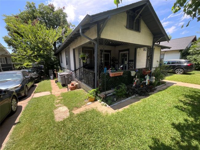 View of front of house featuring a front yard and a porch | Image 16