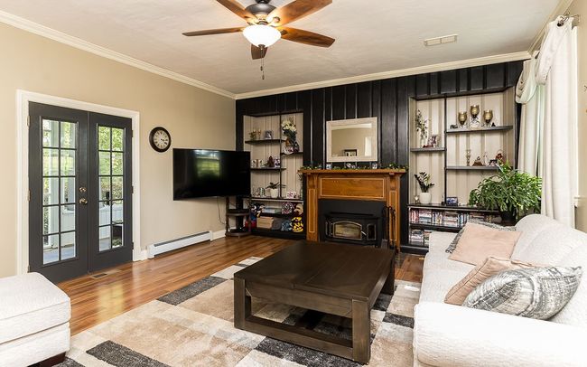 sunk-in livingroom w/french doors to the sun room | Image 28