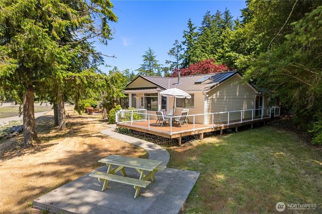 enjoy your morning coffee and sunsets on your deck overlooking the water view. | Image 4