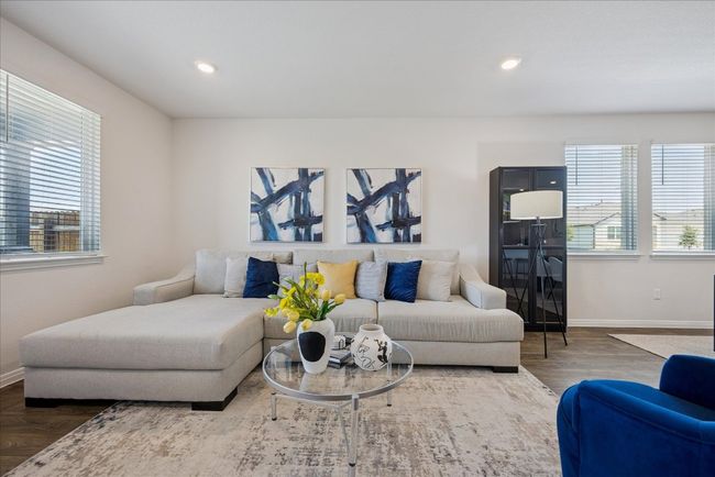 Living room with wood finished floors and recessed lighting | Image 13