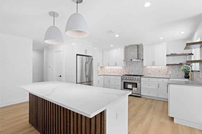 Custom slatted wood island accent | Image 9