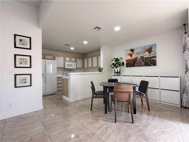 Dining space with recessed lighting, visible vents, and baseboards | Image 15