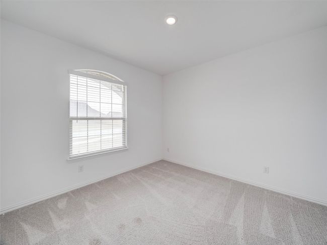 Spare room with light colored carpet, baseboards, and recessed lighting | Image 23