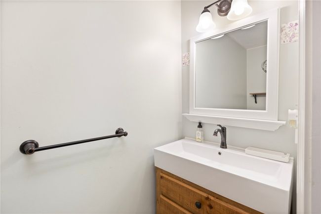 1st floor half bath with custom vanity | Image 11