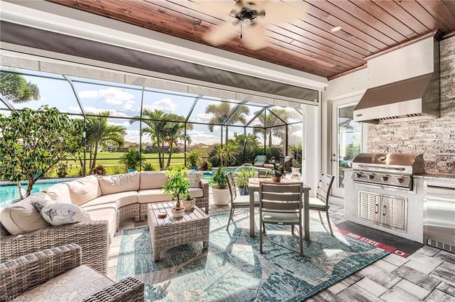 Covered lanai with outdoor grill | Image 38