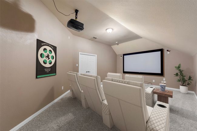 Cinema room with carpet, vaulted ceiling, and baseboards VIRTUALLY STAGED | Image 34