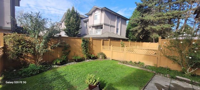 View of yard with a fenced backyard | Image 24