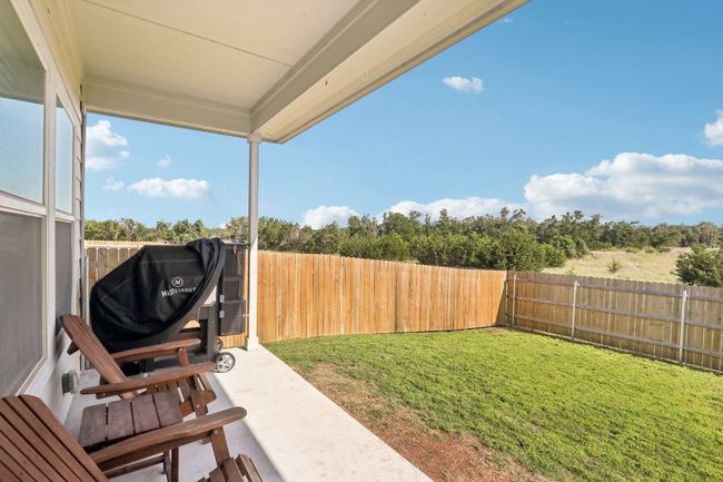 Covered patio for enjoying the evenings outside | Image 35
