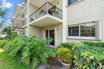 Porch view looking from pool area | Image 1