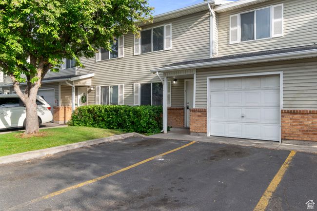 Multi unit property featuring brick siding and uncovered parking | Image 30