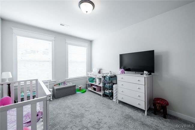 Bedroom with carpet | Image 25