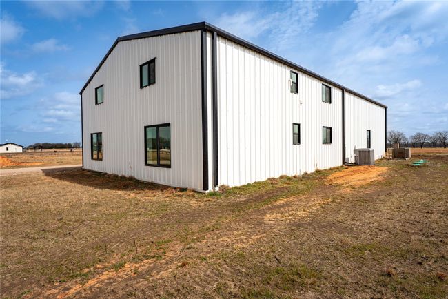 View of side of home with cooling unit | Image 25