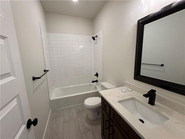Full bathroom with vanity and bathing tub / shower combination | Image 50