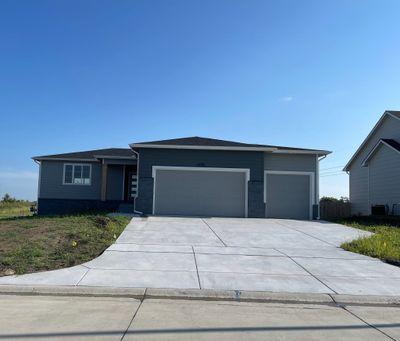 View of front of property with a garage | Image 1