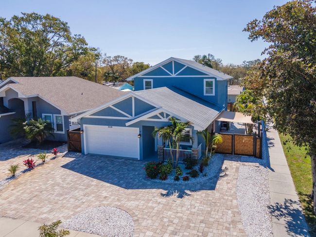 FRONT OF HOME WITH UPDATED LANDSCAPING & BIG CIRCLE DRIVEWAY | Image 55