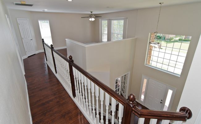 Upstairs Hallway Leads To 3 Guest Bedrooms + A Full Bathroom. | Image 27
