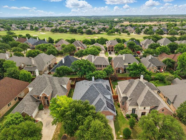 Aerial view of residential area with a golf course | Image 38