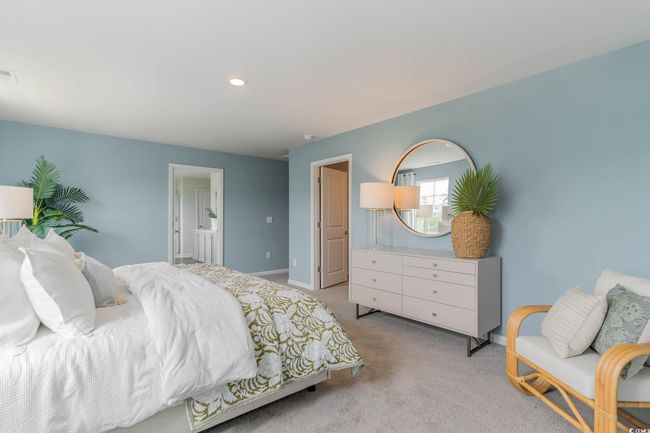 Bedroom with baseboards, light carpet, ensuite bathroom, and recessed lighting | Image 16