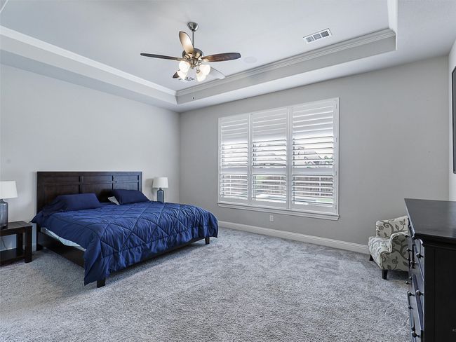 Master bedroom with a view to the backyard | Image 15