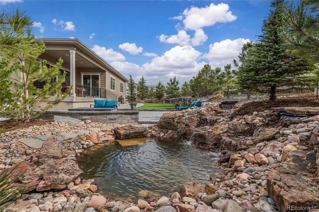 Pond with two waterfalls creates the most peaceful ambiance | Image 45