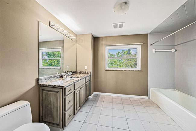 Primary bathroom with tub shower | Image 23