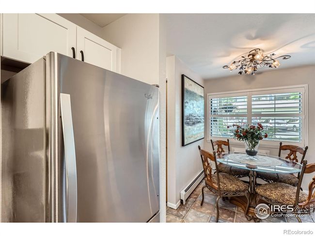 Dining area adjacent to the kitchen | Image 11