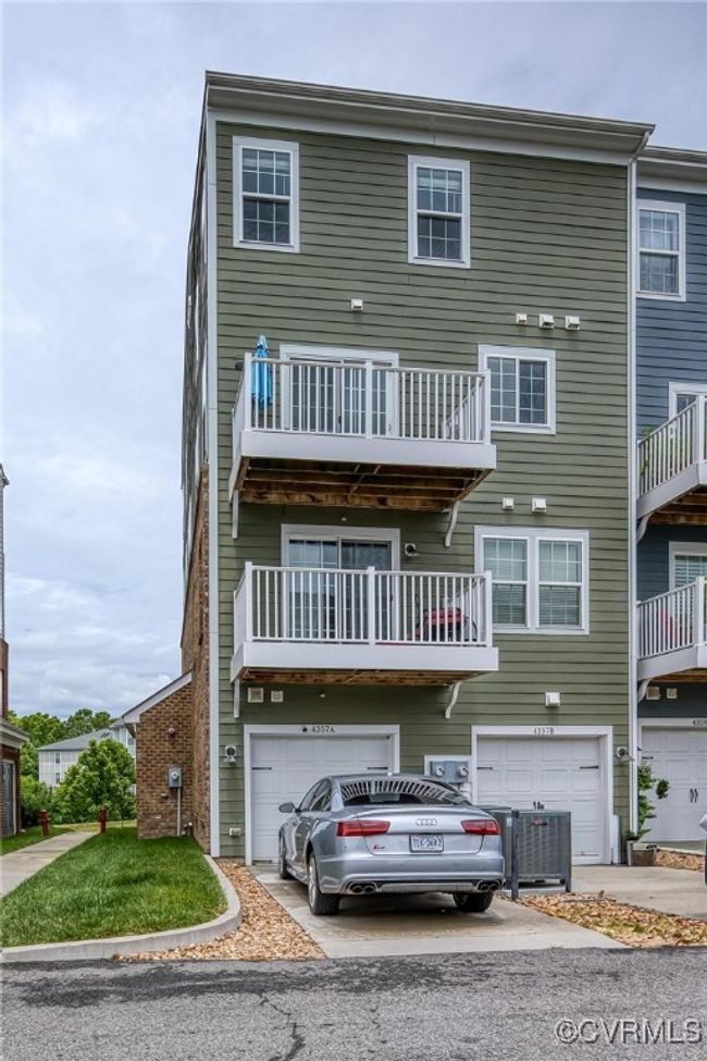 Multi unit property with a garage and driveway | Image 29
